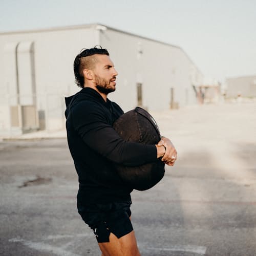 lifestyle image of Midweight Technical Popover Hoodie