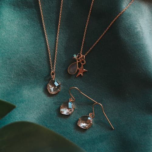 laydown image of Gold Crystal Claw Earring