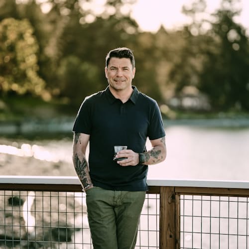 lifestyle image of 72-Hour Merino Two-Button Polo Shirt