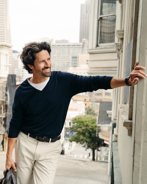 lifestyle image of Cotton Merino V-Neck Sweater