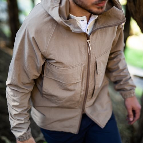 laydown image of Hooded Windbreaker Jacket