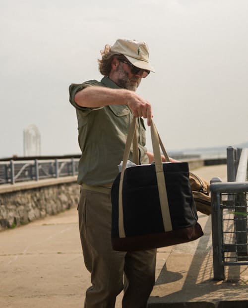 lifestyle image of Coggins Patch Waxed Canvas Tote