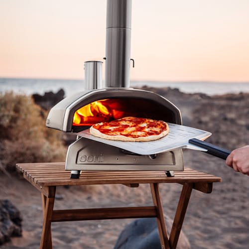 lifestyle image of Ooni Fyra 12 Wood Pellet Pizza Oven