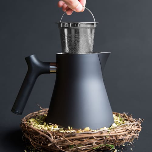 laydown image of Raven Tea Kettle and Steeper