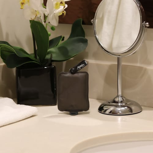lifestyle image of FlatPak Travel Toiletry Bottle