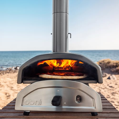 lifestyle image of Ooni Fyra 12 Wood Pellet Pizza Oven