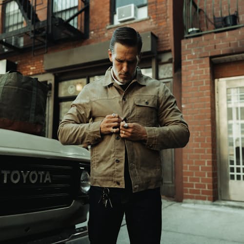 lifestyle image of Flannel-Lined Waxed Trucker Jacket