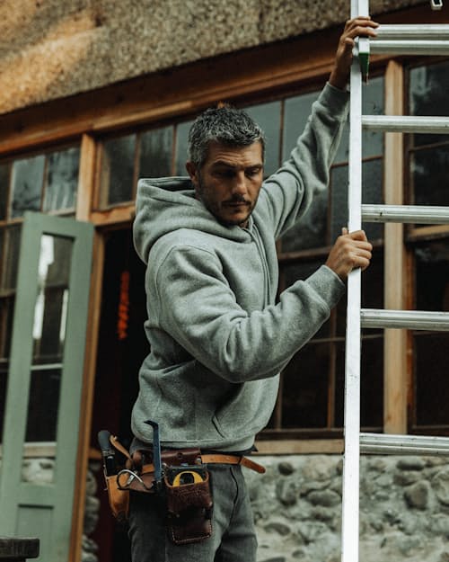 lifestyle image of 10-Year Pullover Hoodie 2.0