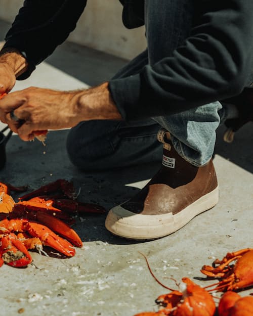 lifestyle image of Huckberry x XTRATUF Legacy Elevate Deck Boot