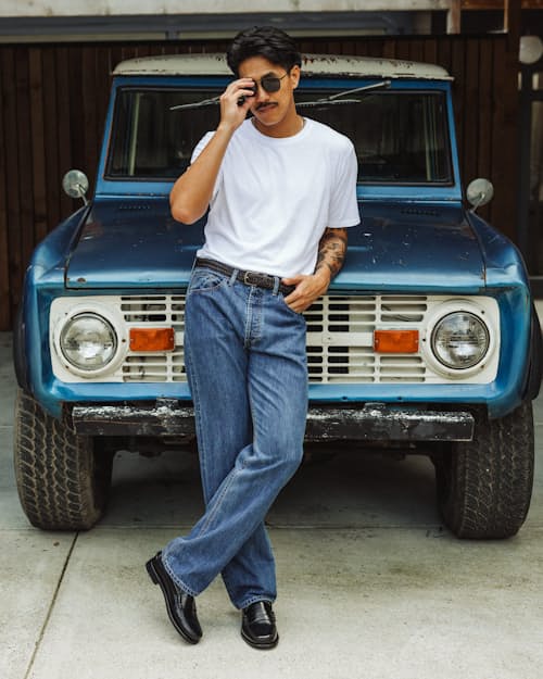 lifestyle image of Classic Tapered Selvedge Denim Jeans
