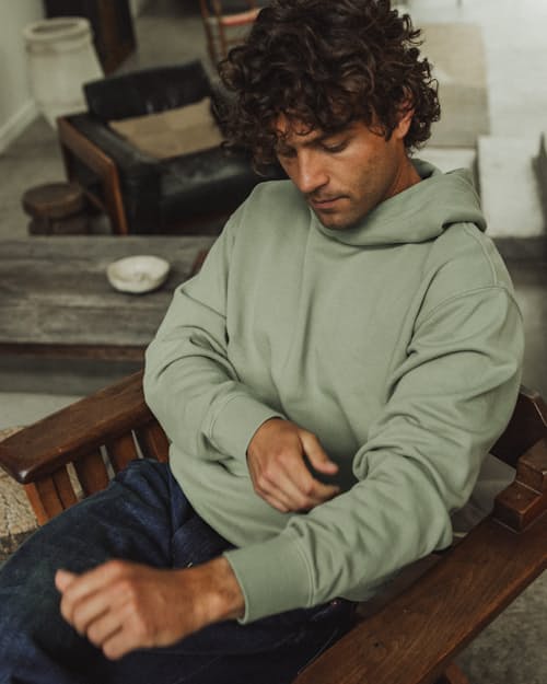 lifestyle image of Midweight Terry Pullover Hoodie