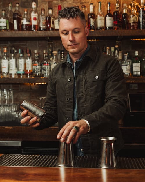 lifestyle image of Flannel-Lined Waxed Trucker Jacket