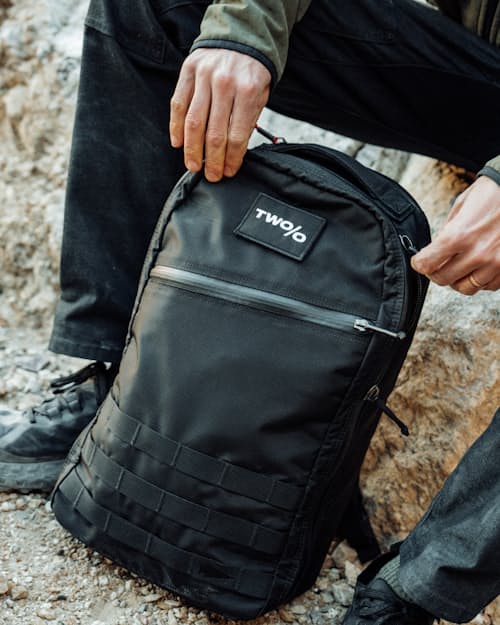 lifestyle image of Michael Easter 2% Collection Bullet Backpack - 15L
