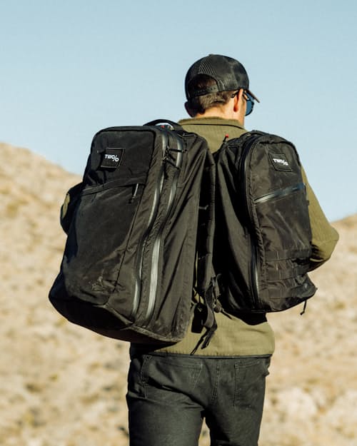 lifestyle image of Michael Easter 2% Collection Bullet Backpack - 15L