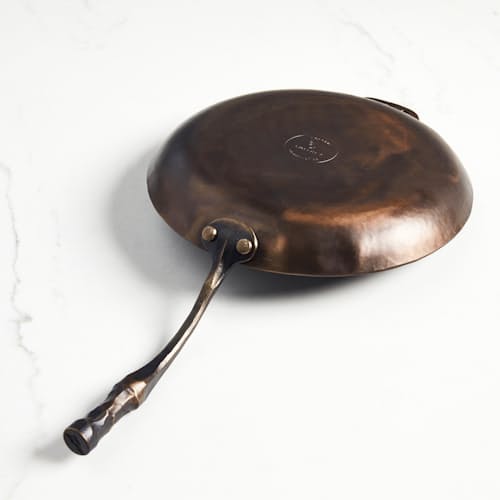 laydown image of Carbon Steel Farmhouse Skillet