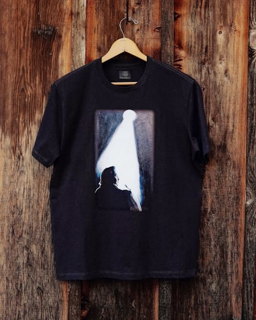 lifestyle image of Man in Black T-Shirt