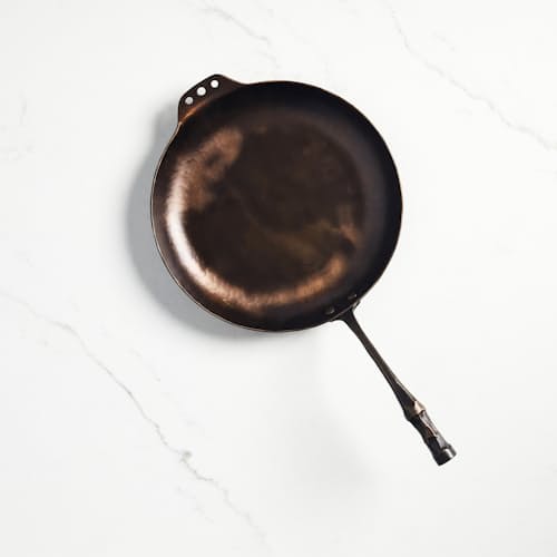 laydown image of Carbon Steel Farmhouse Skillet