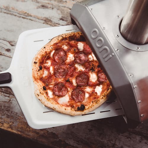 laydown image of Ooni Karu 12 Wood and Charcoal-Fired Portable Pizza Oven
