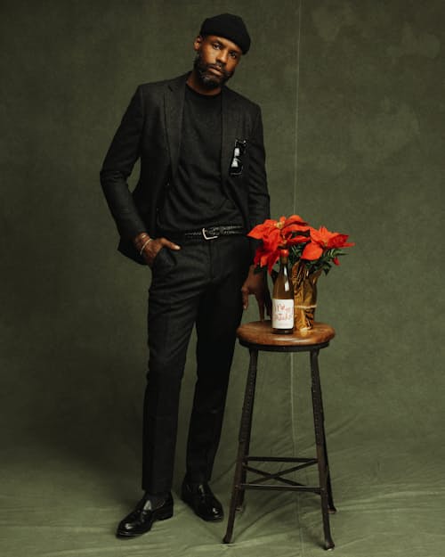 Derrick is 6’3’’, 180 lbs, and wearing blazer size 40