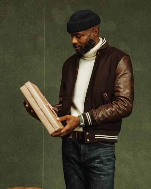 on model image of Leather and Wool-Blend Varsity Bomber Jacket