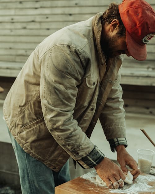 lifestyle image of Flannel-Lined Quilted Waxed Rancher