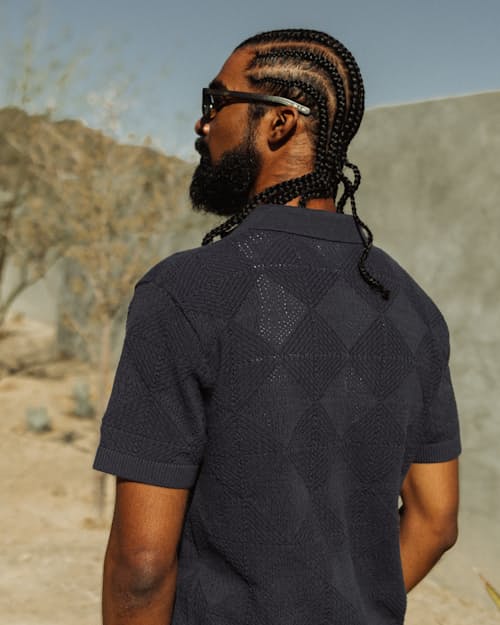 lifestyle image of Textured Button-Up Sweater Polo