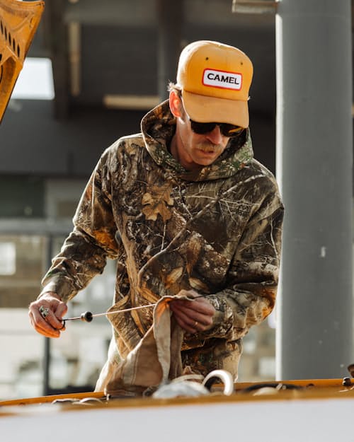 lifestyle image of Realtree® Camo Fleece Pullover Hoodie