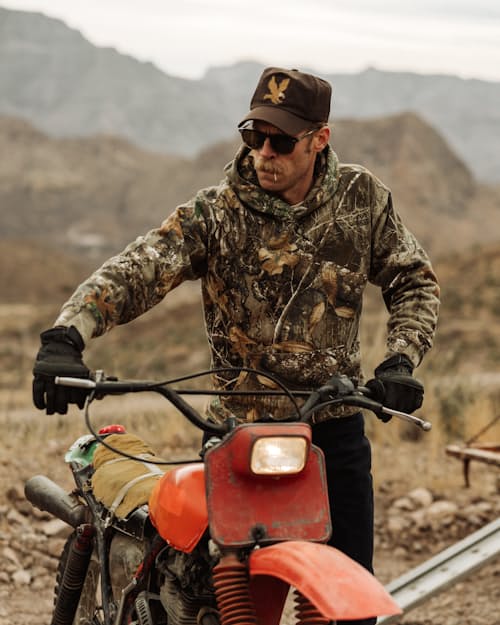 lifestyle image of Realtree® Camo Fleece Pullover Hoodie