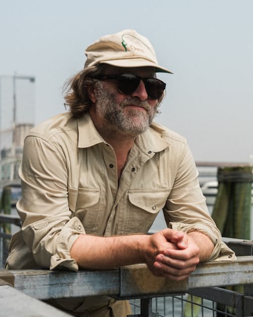 lifestyle image of HB x David Coggins Sportsman Supply Hat