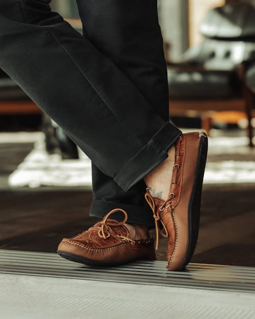lifestyle image of Huckberry x Quoddy Coolslide Stamped Leather Slipper