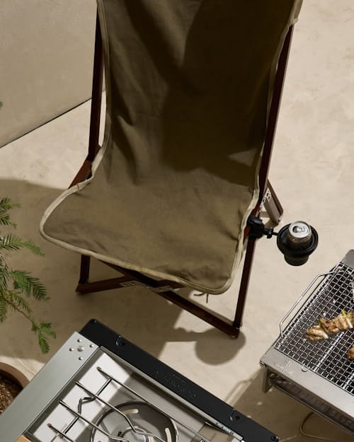 lifestyle image of "Campfire Director" Vaquero Chair