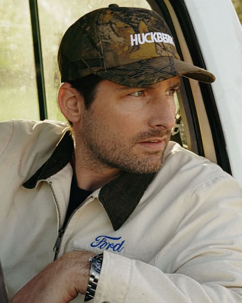 lifestyle image of The Trailhead Camo Snapback