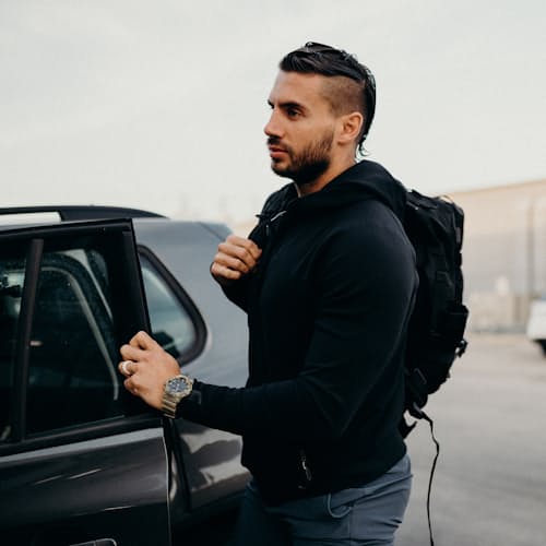 lifestyle image of Midweight Technical Popover Hoodie