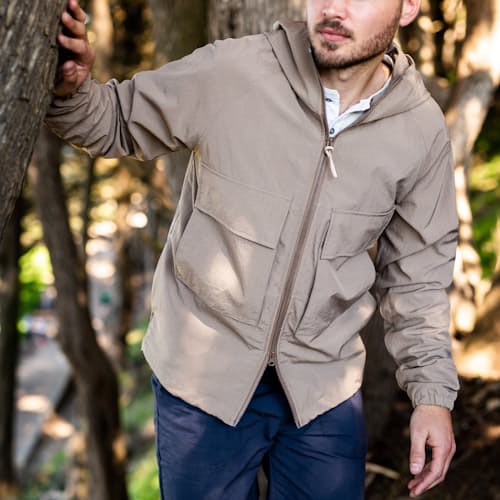 laydown image of Hooded Windbreaker Jacket