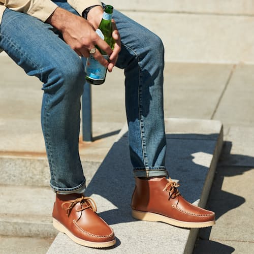 laydown image of Lucas Leather Moccasin Boot