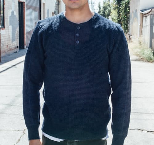 laydown image of Button Henley Sweater
