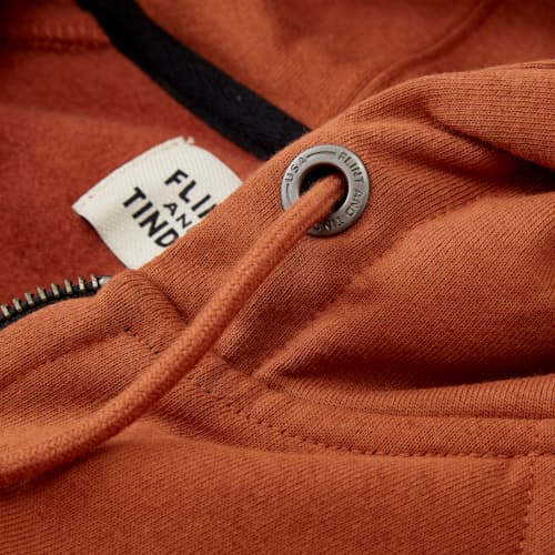 lifestyle image of 10-Year Full Zip Hoodie