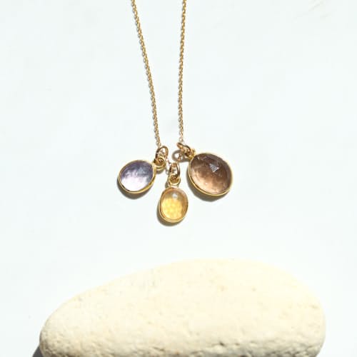 laydown image of Women's Earth, Wind & Fire Necklace