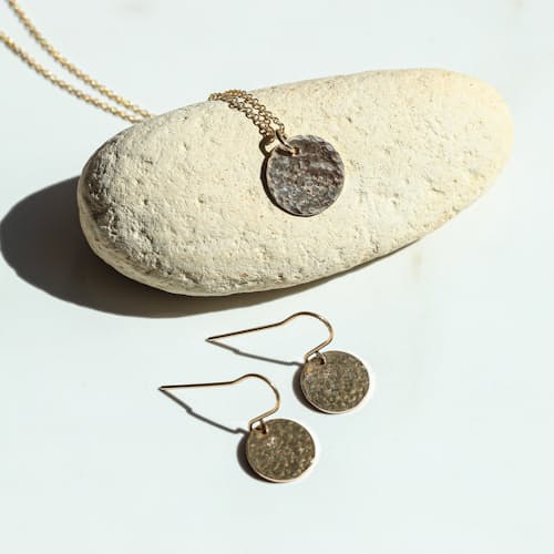 laydown image of Women's Gold Water Earrings + Necklace