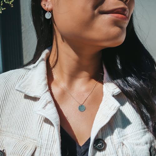 laydown image of Women's Gold Water Earrings + Necklace