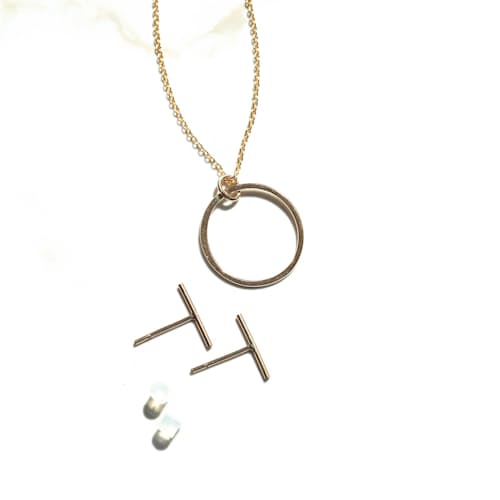 laydown image of Women's Line Stud & Infinite Gold Necklace