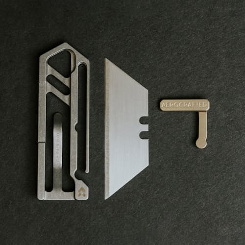 laydown image of Sideslip Titanium Utility Knife