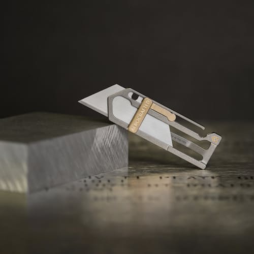 laydown image of Sideslip Titanium Utility Knife