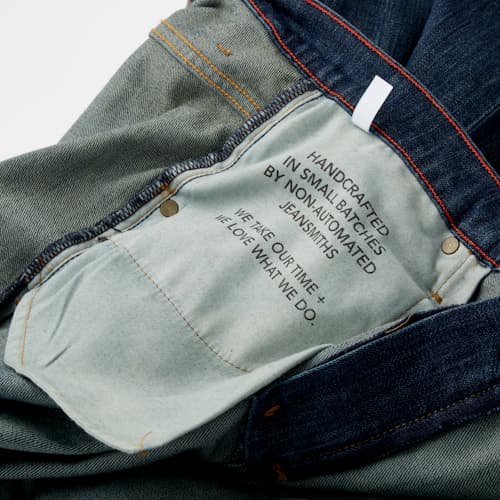 laydown detail image of Jones Slim Straight Denim Jeans