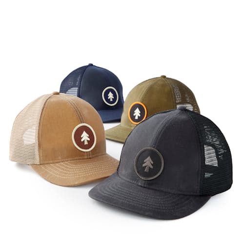 laydown image of Waxed Canvas Tree Trucker Hat - Medium Profile