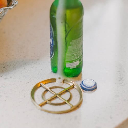 laydown image of Brass Bottle Opener