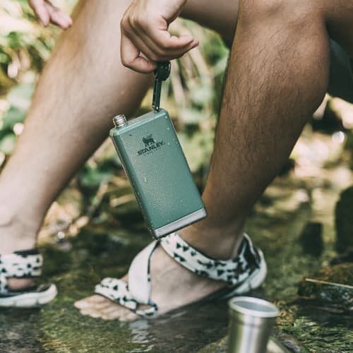 laydown image of Adventure Pre-Party Shot Glass + Flask Set