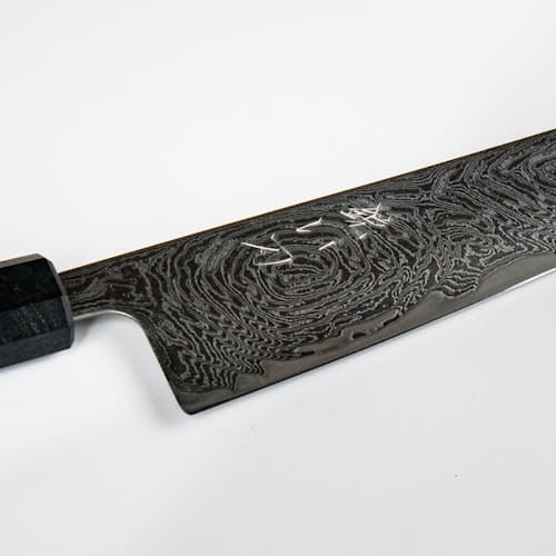 laydown image of Gyuto Swirl Damascus