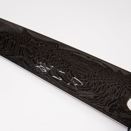 laydown image of Gyuto Swirl Damascus