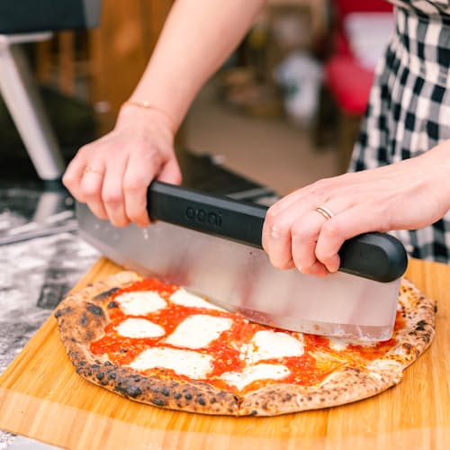 lifestyle image of Ooni Pizza Rocker Blade